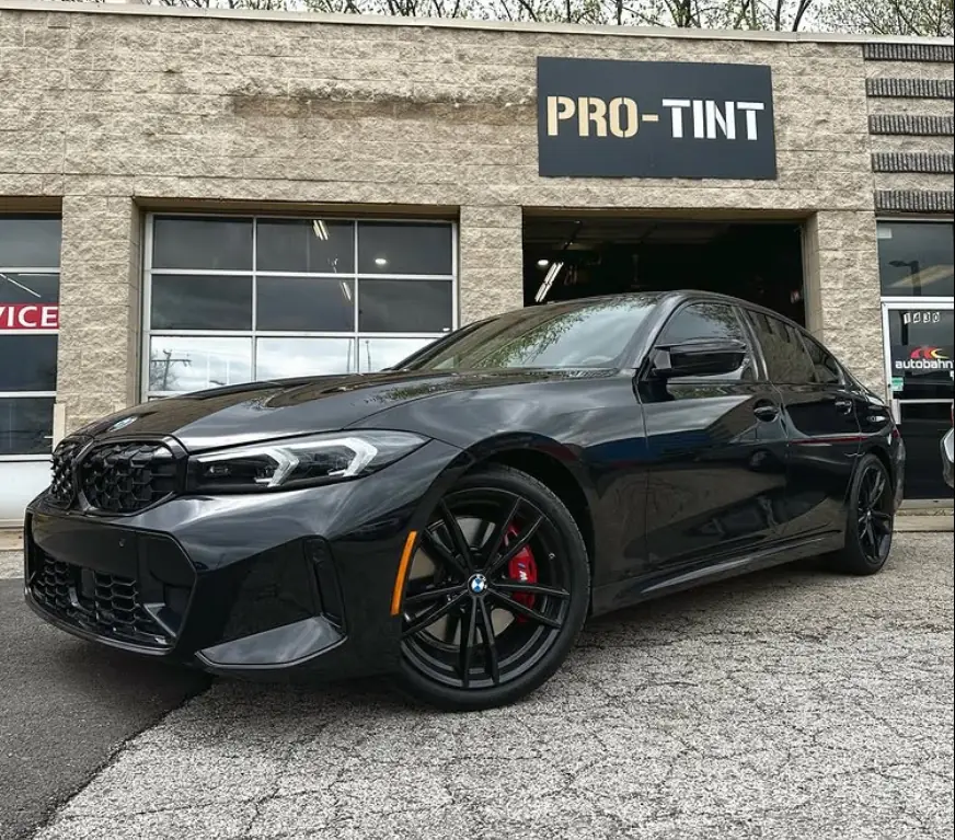 Black BMW 3 Series outside Pro-Tint