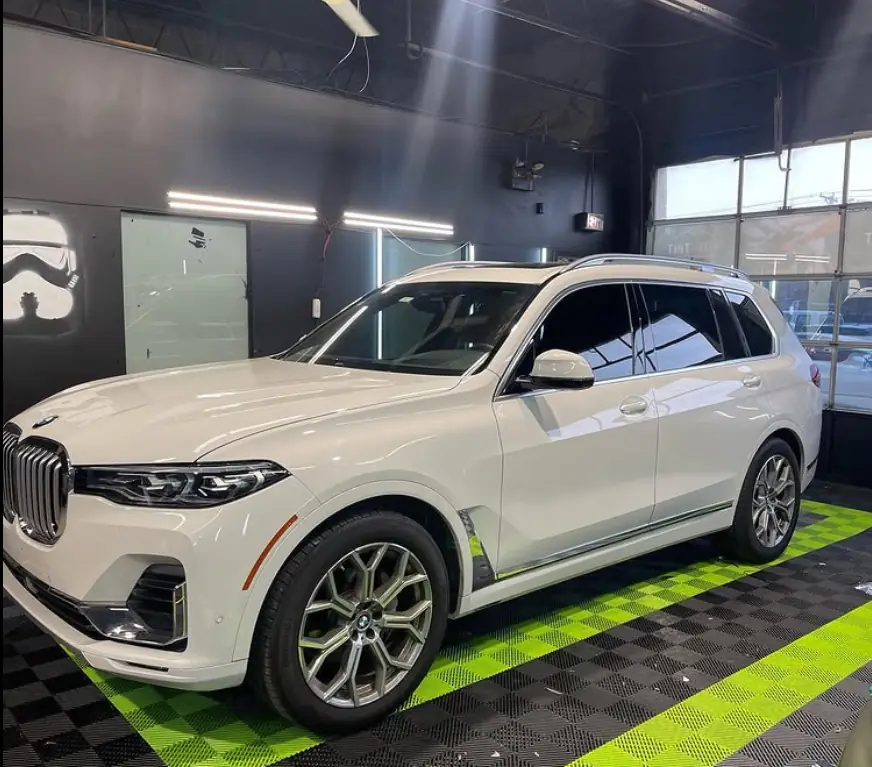 White BMW X7 inside the Pro-Tint shop