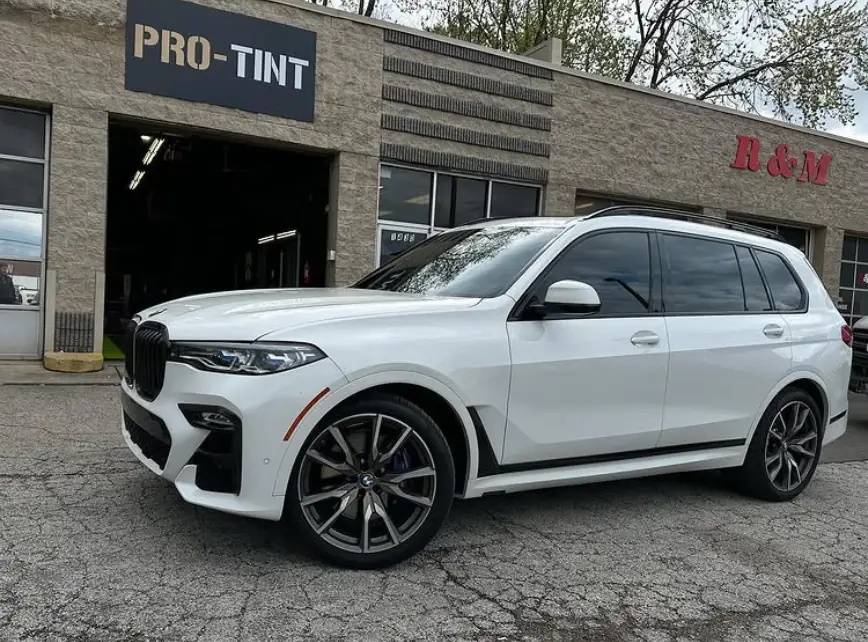 White BMW X7 in front of the Pro-Tint building